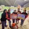Kenakan Ornamen Dayak, Peserta Lomba Supporter Turnamen Voli Polresta Palangka Raya Pukau Juri dan Penonton