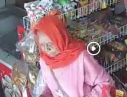 Heboh! Perempuan Berkerudung Merah Diduga Gunakan Uang Mainan di Sampit